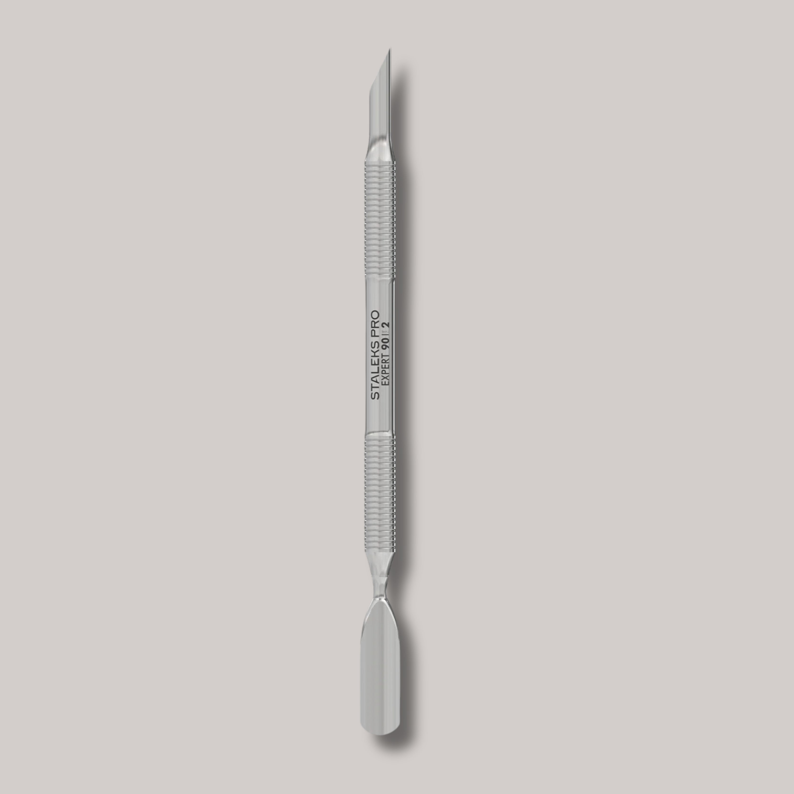 Manicure Pusher EXPERT 90 TYPE 2
"EXPERT 90 TYPE 2 Manicure Pusher with beveled slant pusher and rounded wide pusher for cuticle care, nail cleaning, and gel polish removal.