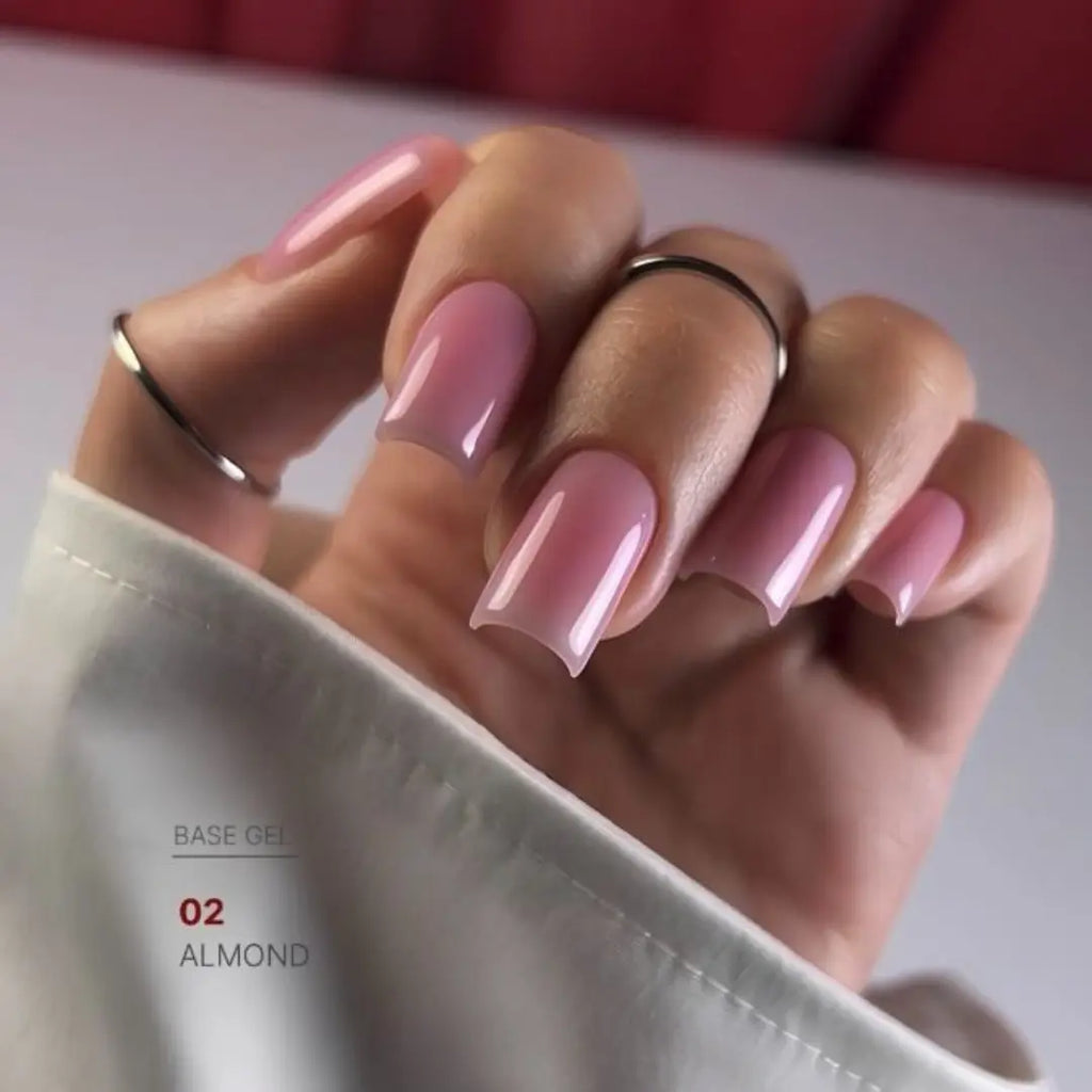 Warm almond nude nail base texture swatch, natural camouflage effect