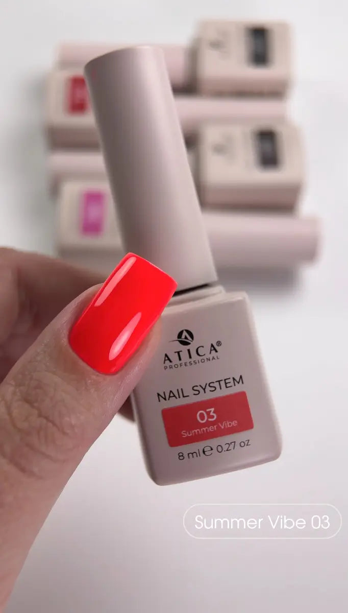 ATICA nail polish bottle with a hand showing red nail polish