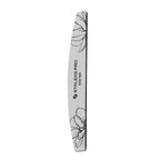 Closeup of Staleks PRO expert 40 crescent nail file showing white abrasive and wooden core with foam