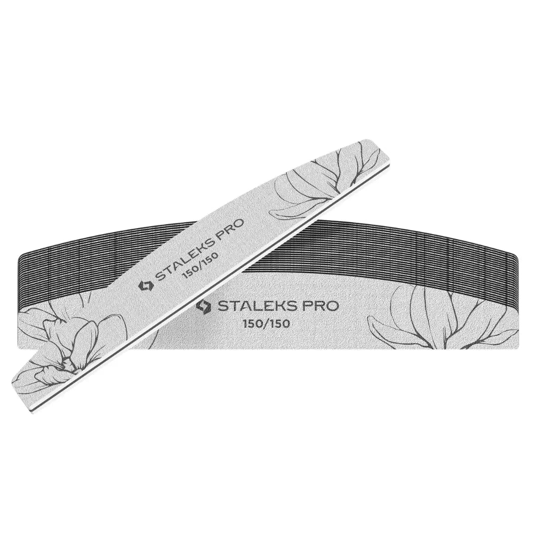 Closeup of Staleks PRO expert 40 crescent nail file showing white abrasive and wooden core with foam
