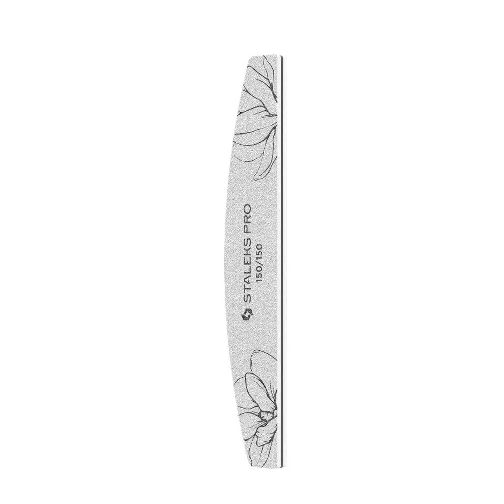 Closeup of Staleks PRO expert 40 crescent nail file showing white abrasive and wooden core with foam
