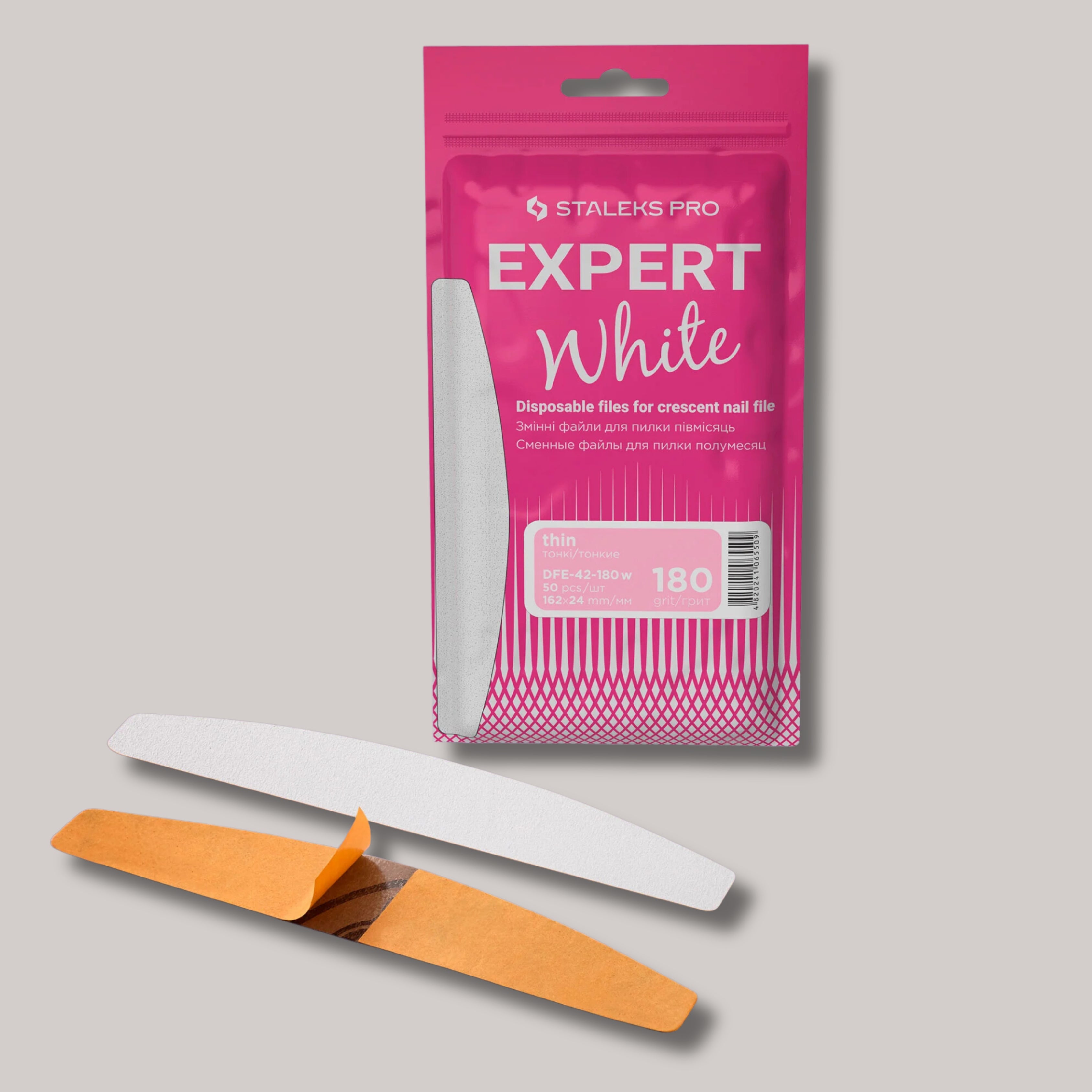 Disposable White Files For Crescent Nail File EXPERT 42, 180 grit, 50 pcs, designed for correction and shaping of natural and artificial nails with a reliable adhesive base.

