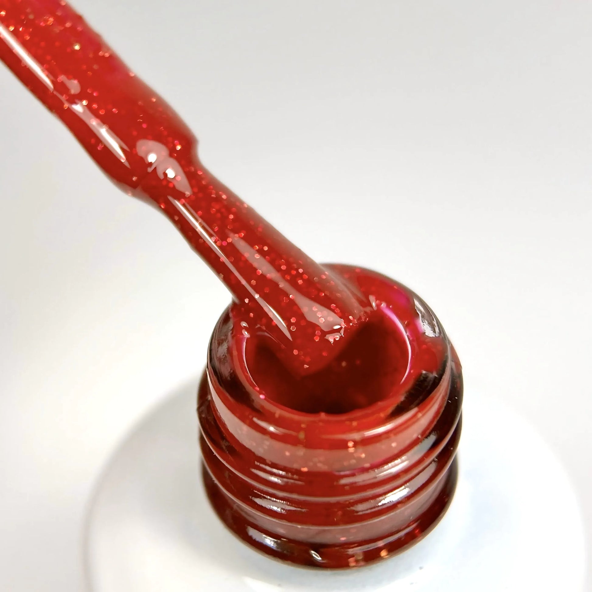 Jelly Gelly Gel Polish Fizzy Berry – vibrant red gel polish with glitter in an 8ml bottle.