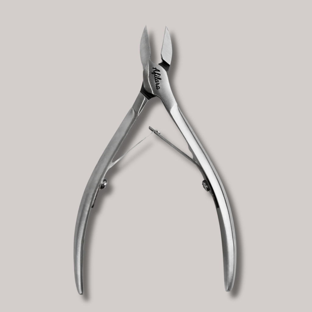 Afilara Professional Nail Clippers 16mm – ergonomic design, sharp blades, ideal for manicure and pedicure care.

