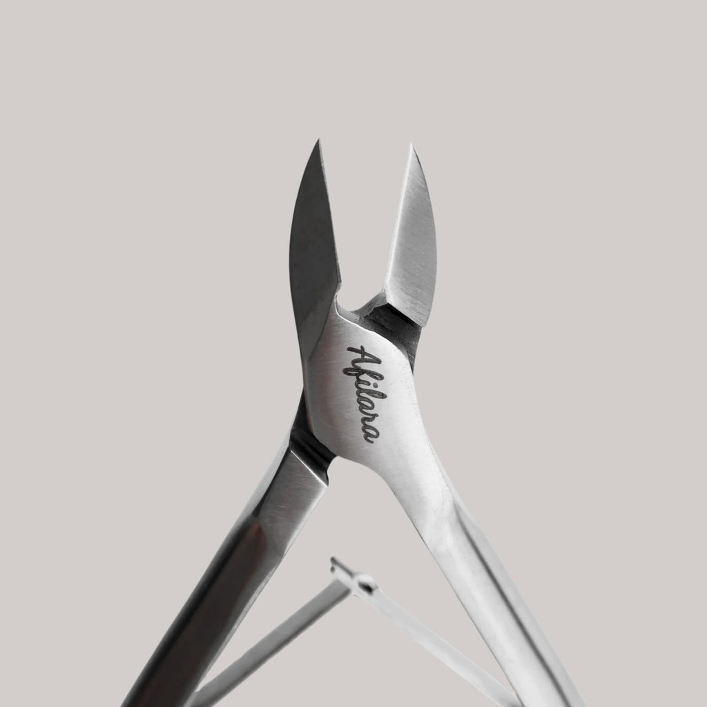 Afilara Professional Nail Clippers 16mm – ergonomic design, sharp blades, ideal for manicure and pedicure care.

