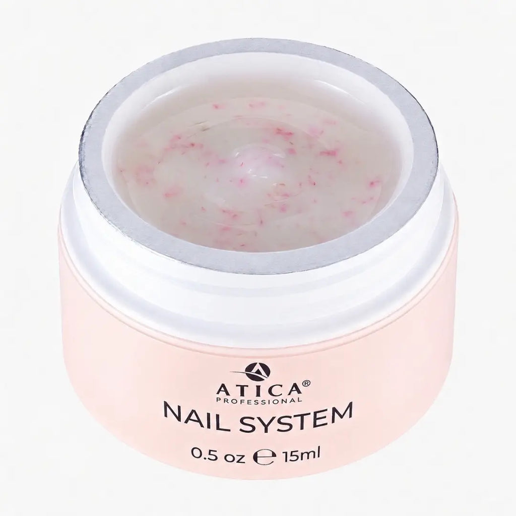 Jar of Atica Professional Nail System on a white background