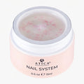 Jar of Atica Professional Nail System on a white background