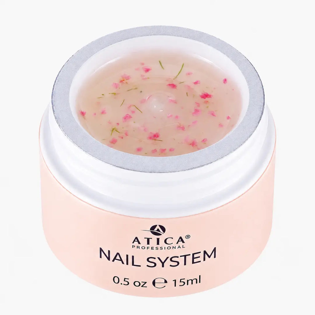 Pink jar of Atica Professional Nail System on a white background