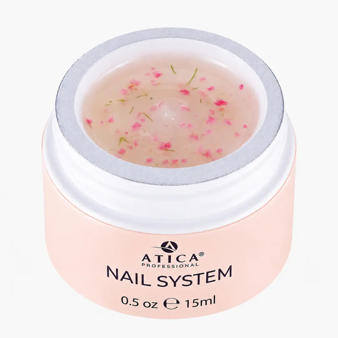 Pink jar of Atica Professional Nail System on a white background