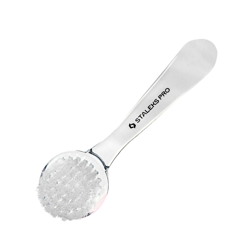Durable nail cleaning brush with synthetic bristles, curved handle, protective cap, and compact design for easy use and transport.