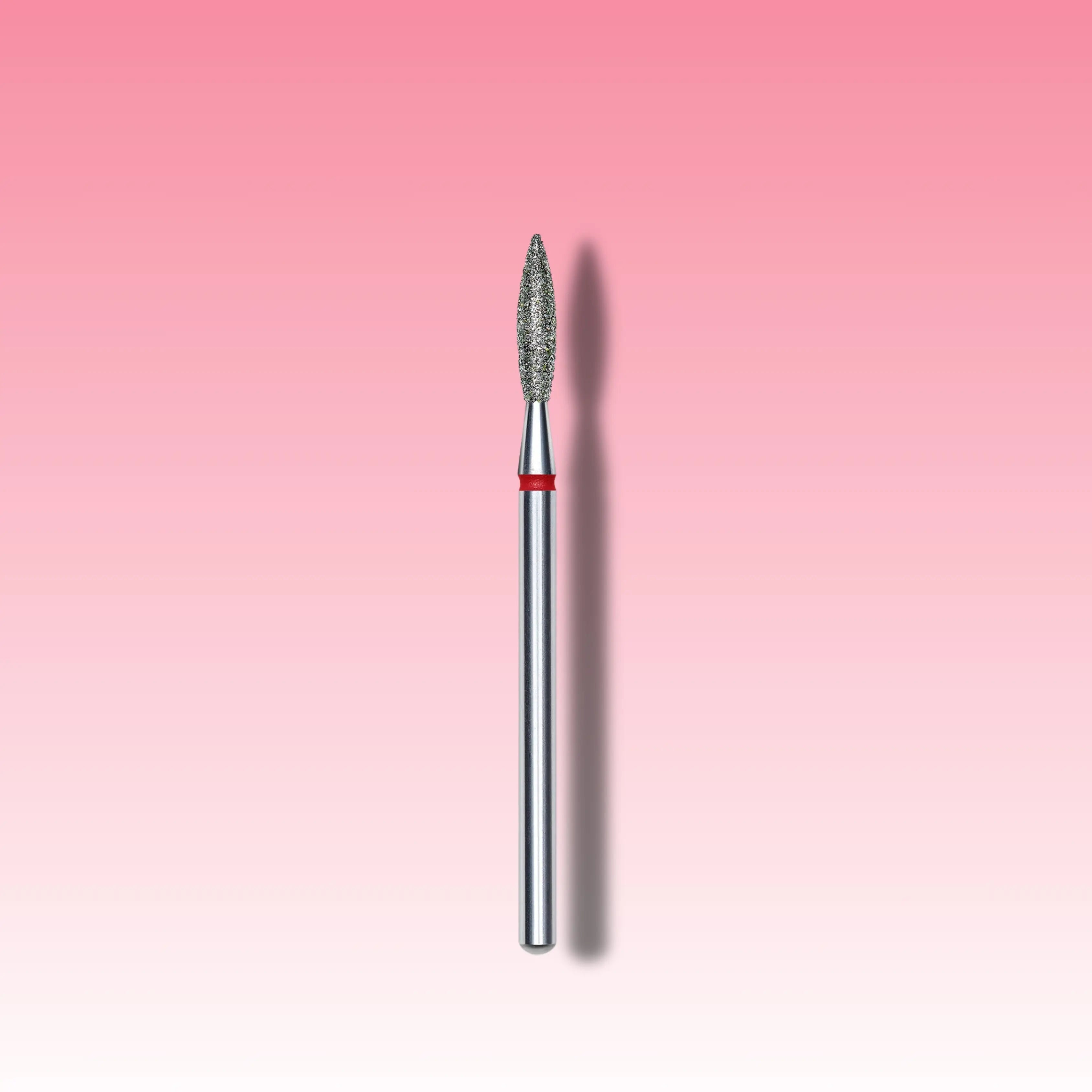 Soft abrasive red nail drill bit for safe and precise manicures and pedicures.