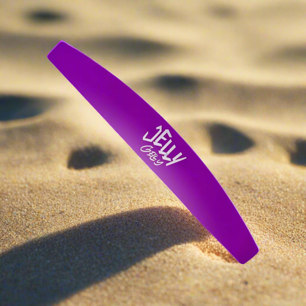 Jelly Gelly Plastic Nail File Base in purple with a half-moon shape for precision filing.

