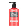 A 500 ml bottle of KUNDAL Honey & Macadamia Body Lotion in English Rose scent, featuring a vibrant coral-red translucent bottle with a black pump dispenser and a black label.