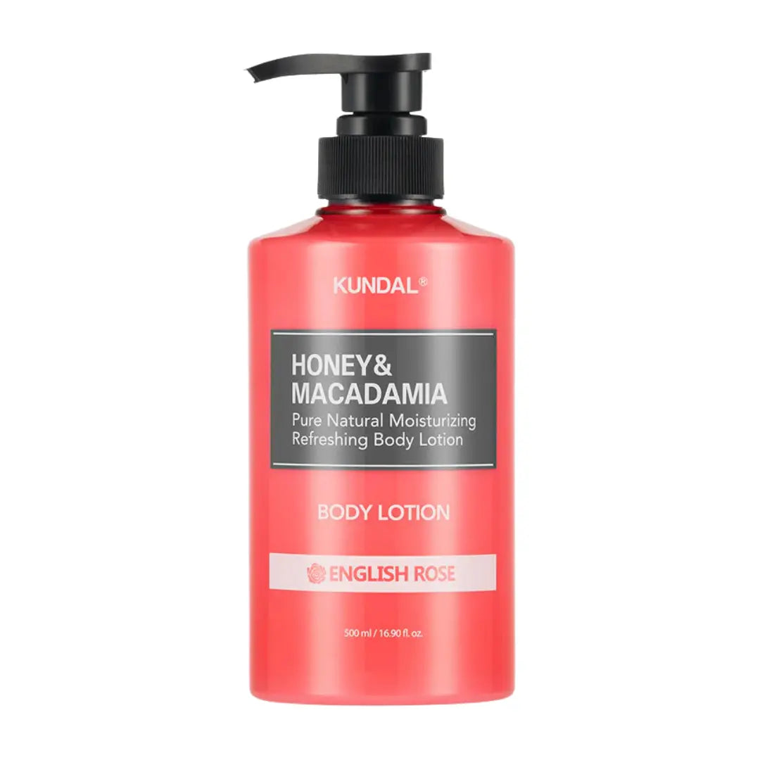 A 500 ml bottle of KUNDAL Honey & Macadamia Body Lotion in English Rose scent, featuring a vibrant coral-red translucent bottle with a black pump dispenser and a black label.