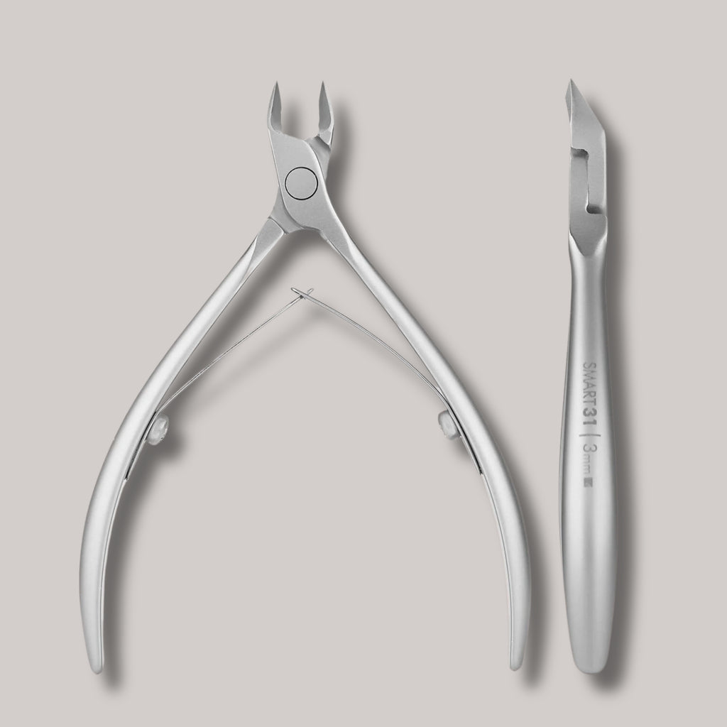 Professional Cuticle Nippers SMART 31 – 3 mm
"Stainless steel cuticle nippers with ergonomic short handles and sharp 3 mm blades. Designed for professional manicures, sterilization-safe, and corrosion-resistant.