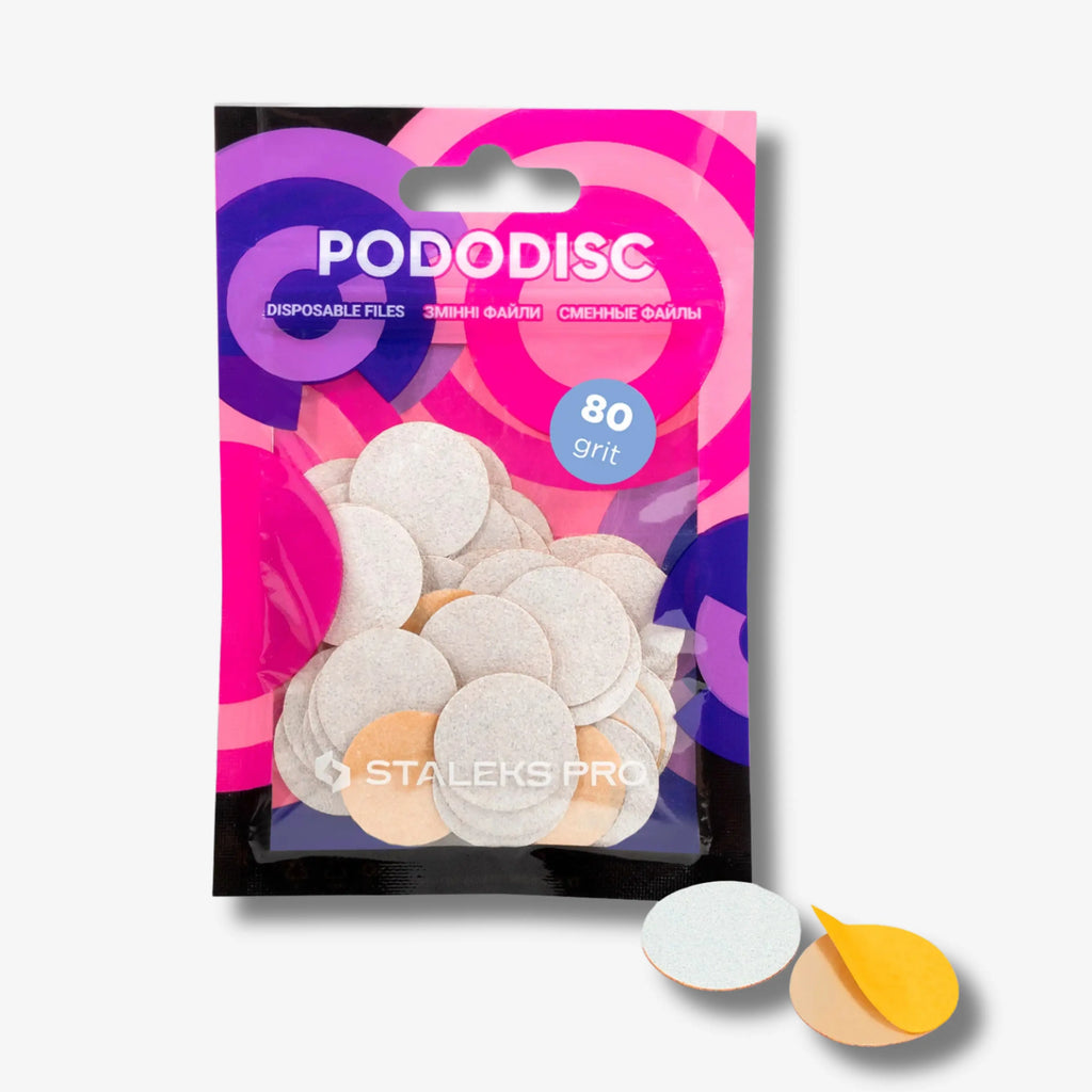 White disposable refill pads for PODODISC STALEKS PRO M (50 pcs) in various grit levels for precise foot care.