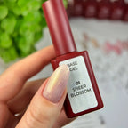 Sheer milky nude nail base texture swatch, soft pearly glow effect