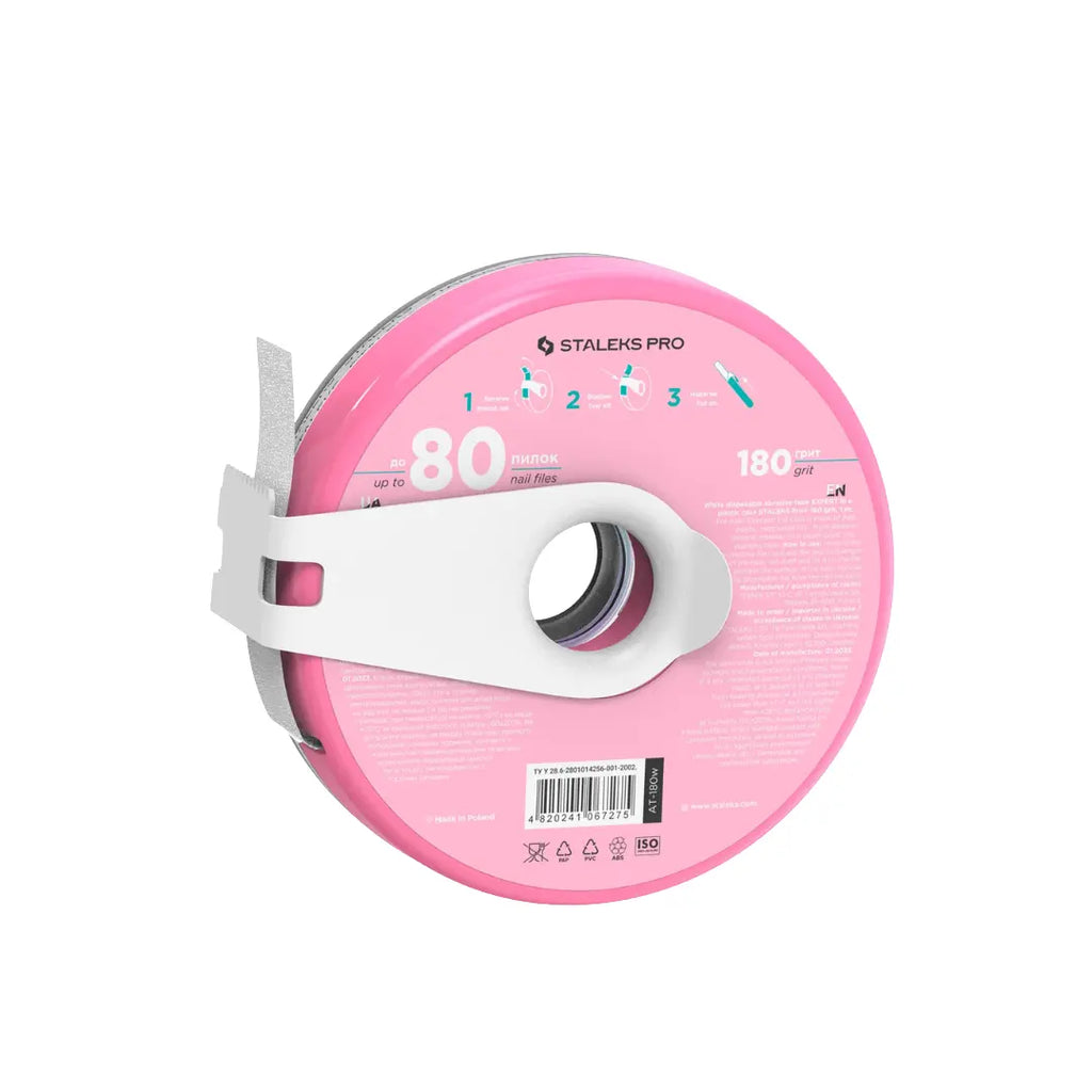 Closeup of Staleks PRO donut 180 grit adhesive tape backing and cutting clip