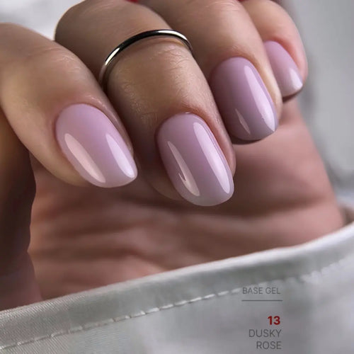 Dusky rose nude nail base texture swatch, muted pink camouflage effect
