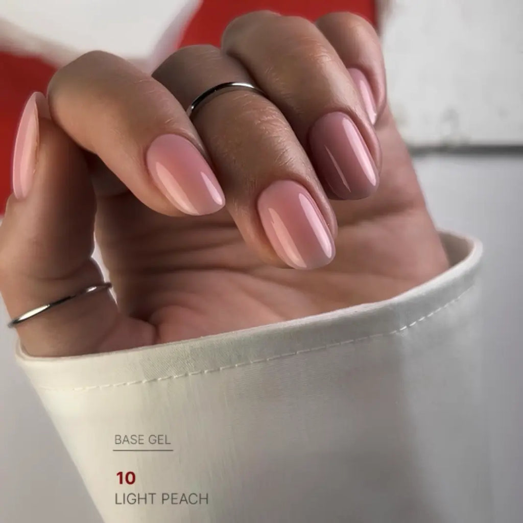 Light peach nail base texture swatch, fresh warm camouflage effect