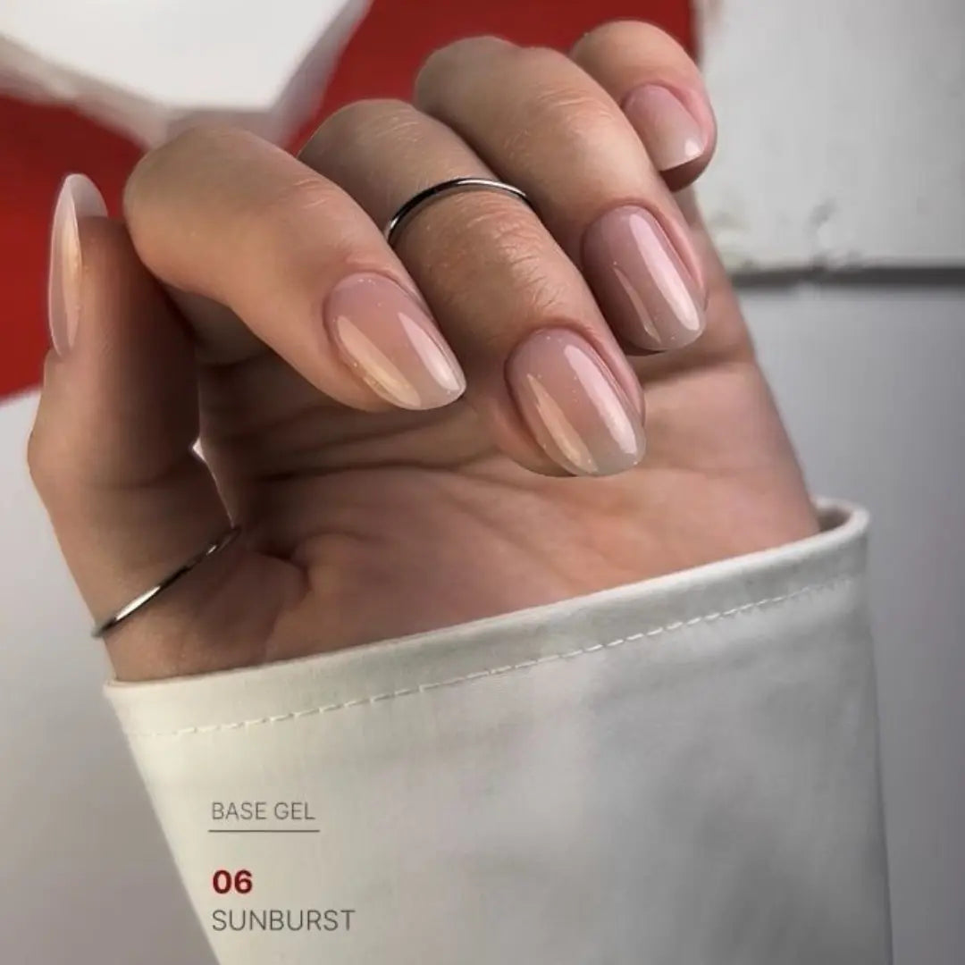 Sunburst nude nail base texture swatch, soft micro shimmer camouflage