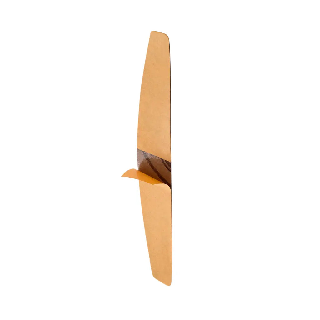 Closeup of Staleks PRO crescent 240 grit thin adhesive nail file for cuticle precision