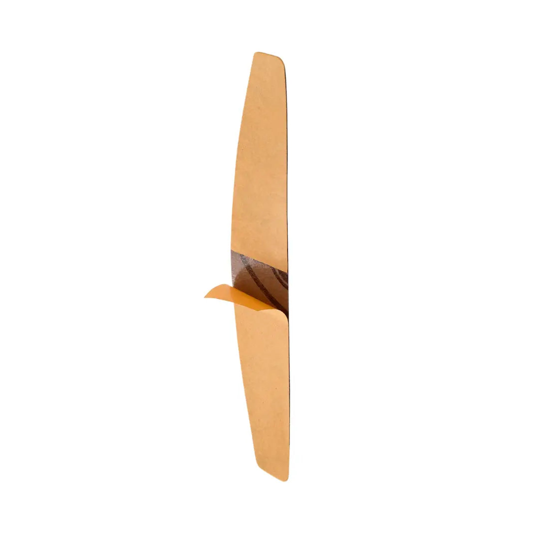 Closeup of Staleks PRO crescent 240 grit thin adhesive nail file for cuticle precision