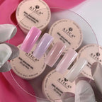 Nail polish samples with ATICA branding on a pink tray.