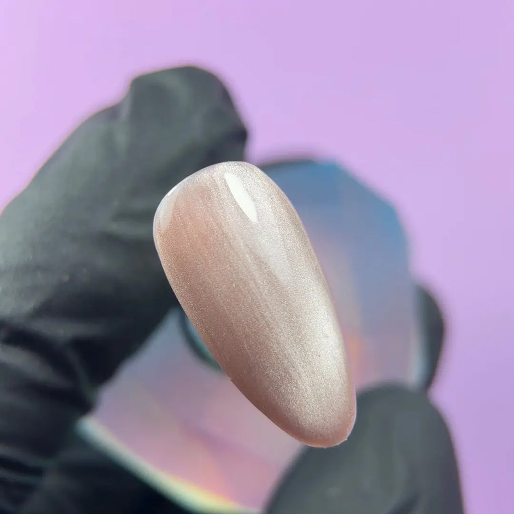 Highly pigmented rich Clay Silk color with dimensional cat eye magnet effect gel polish swatch closeup