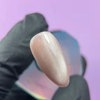 Highly pigmented rich Clay Silk color with dimensional cat eye magnet effect gel polish swatch closeup