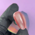 Highly pigmented rich Bloom Silk color with dimensional cat eye magnet effect gel polish swatch closeup