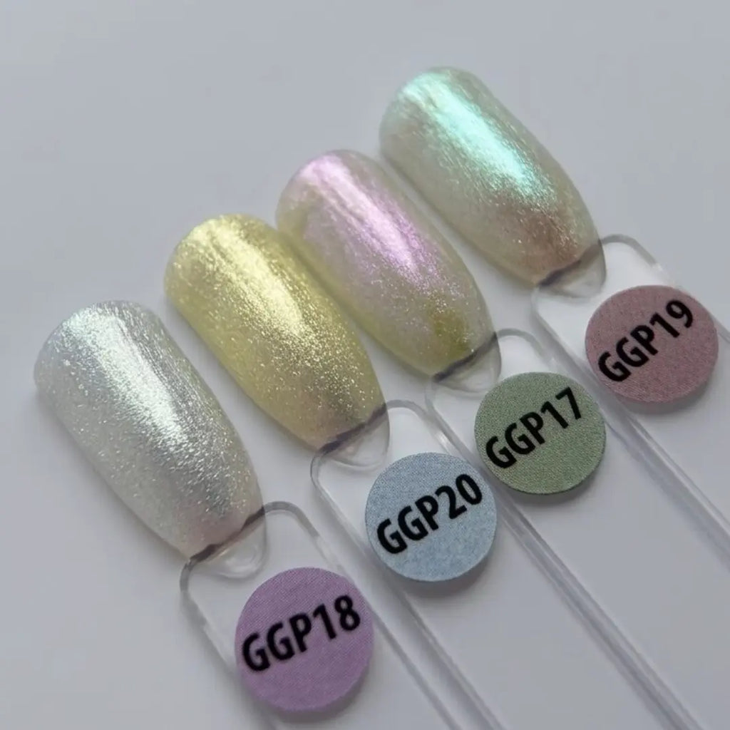 Set of glittery nail samples with color labels on a white background