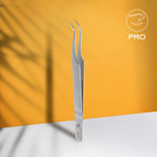 Curved tweezer tip closeup with ergonomic handle grooves