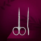 Magnolia engraved scissor handles and microscope sharpened blades