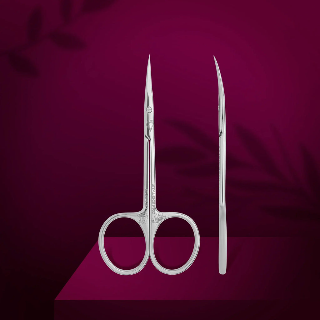 Elongated scissor handles and microscope sharpened tip closeup