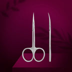 Elongated scissor handles and microscope sharpened tip closeup
