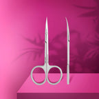 Polished scissor blades and elongated handle closeup