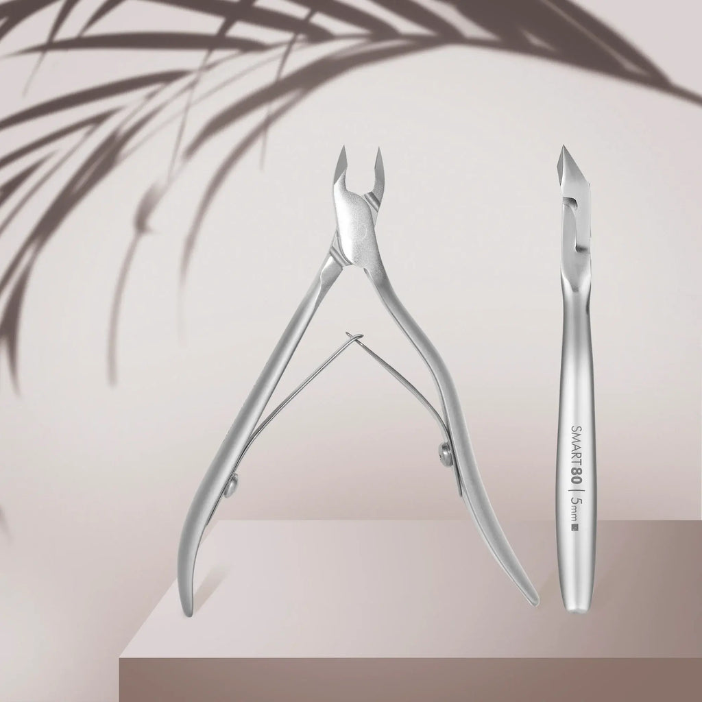 Professional Cuticle Nippers SMART 80 – 5 mm
"High-precision cuticle nippers with ergonomic handles and sharp stainless steel blades. Designed for professional use, sterilization-safe, and corrosion-resistant.