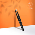 Narrow beveled tweezer tip closeup for fine eyebrow hairs