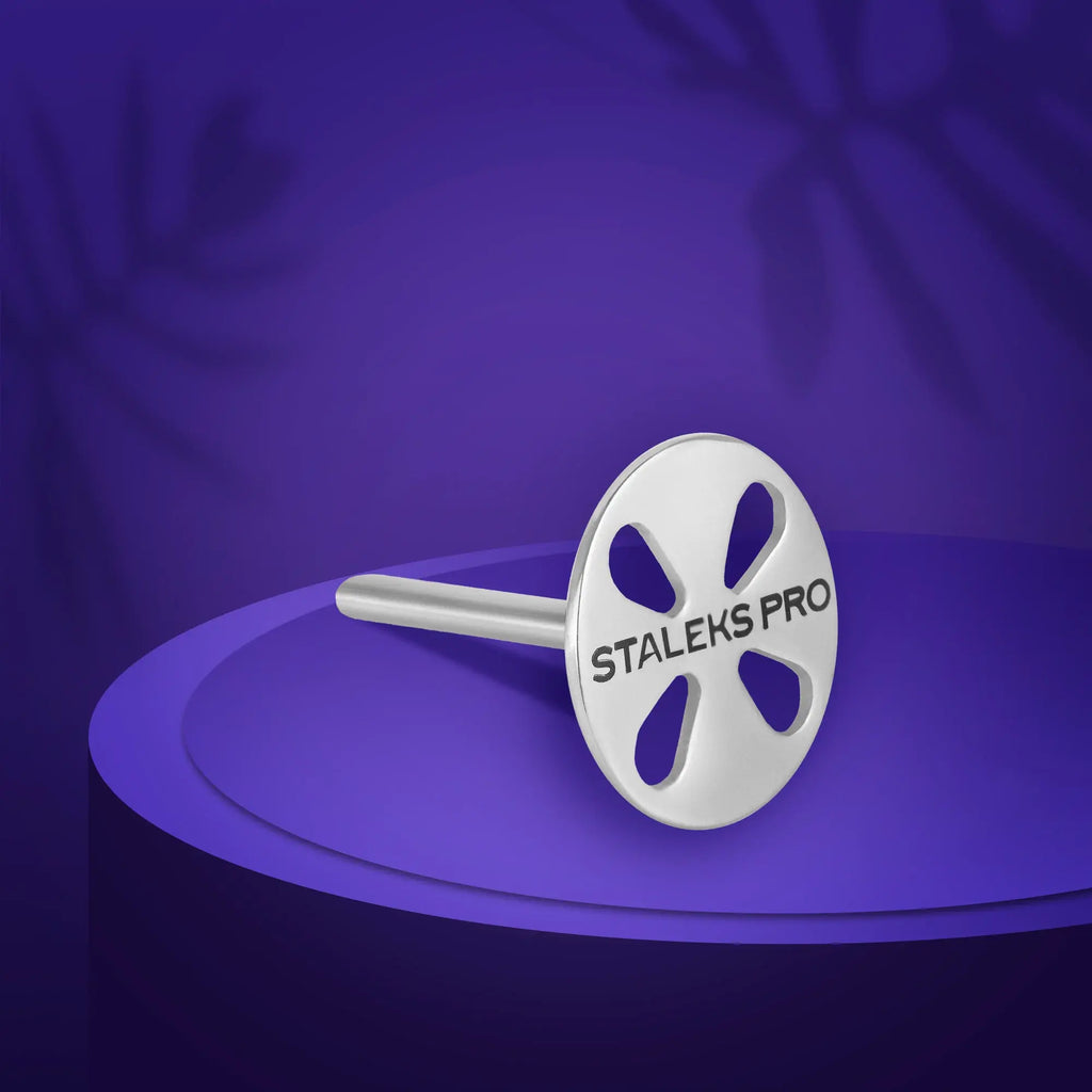 PODODISC L EXPERT pedicure disc (25 mm) with 5 disposable 180-grit files. Stainless steel, non-slip, lightweight, and sterilization safe.