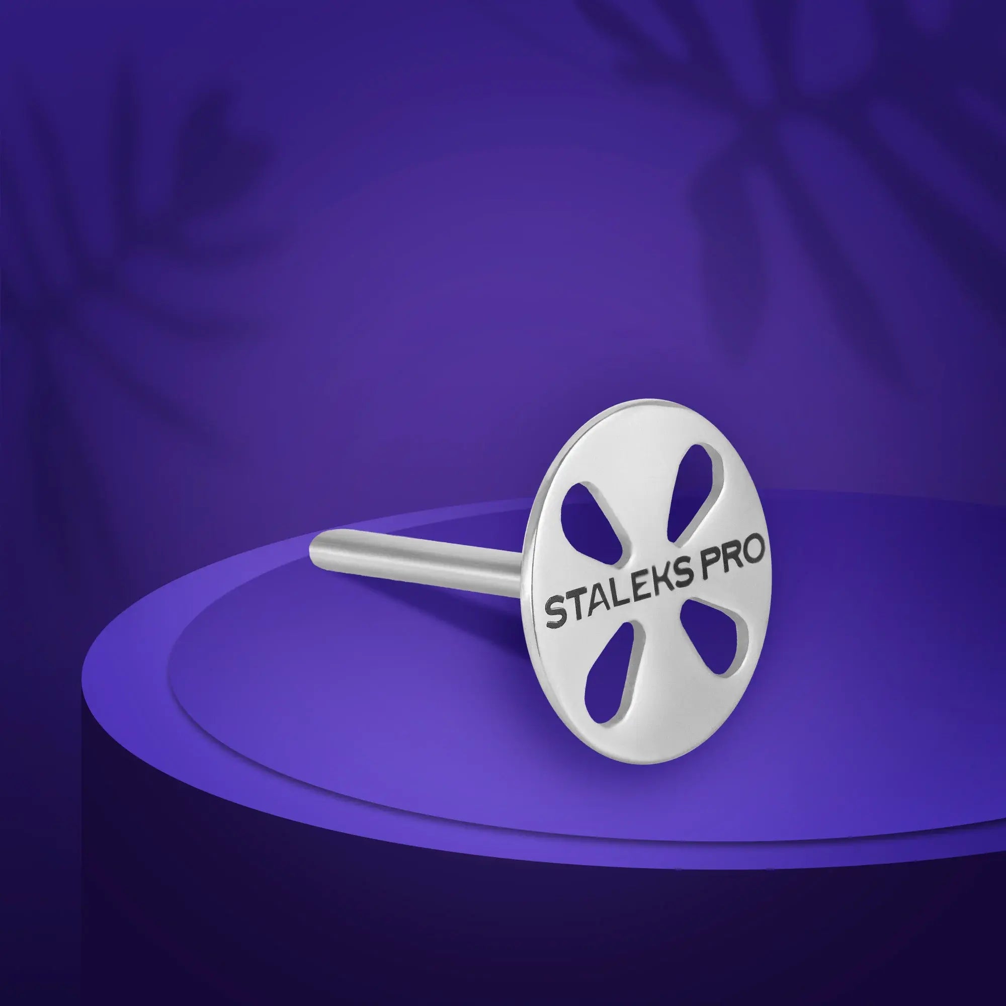 PODODISC L EXPERT pedicure disc (25 mm) with 5 disposable 180-grit files. Stainless steel, non-slip, lightweight, and sterilization safe.
