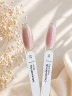 Two nail gel swatches labeled 29 Satin and 30 Pure Nude by Exel Builder Gel, displayed on white sticks with a glossy nude-pink finish, set against a soft beige fabric backdrop with dried flowers.