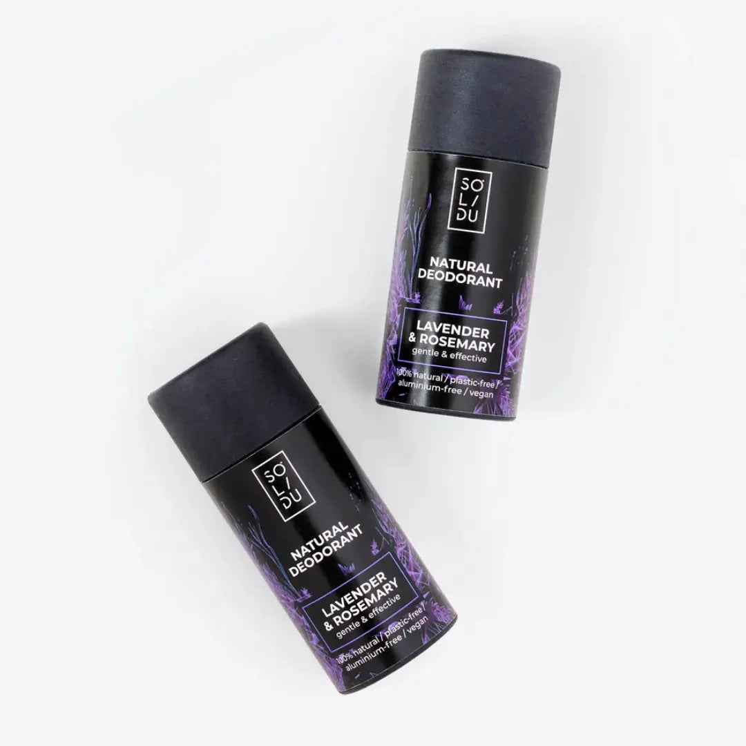 Two bottles of SOL DU natural deodorant with lavender and rosemary scent on a white background