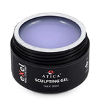 Black container of Atica sculpting gel with purple gel inside on a white background