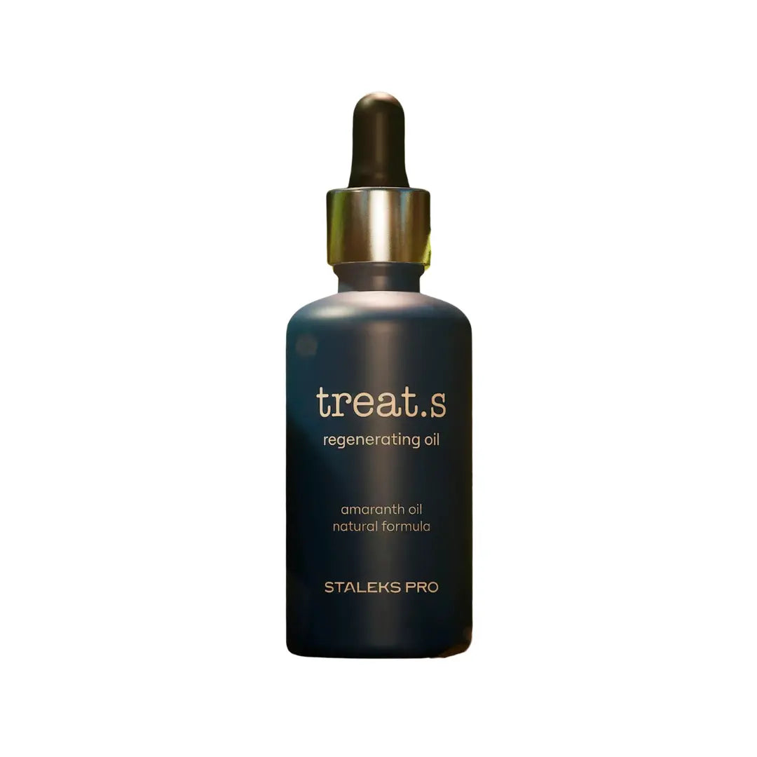 Bottle of treat.s regenerating oil with dropper on a white background