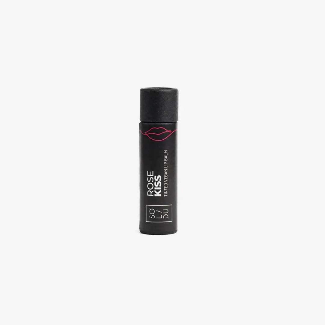 Black lip balm container with 'Rose Kiss' text on a white background