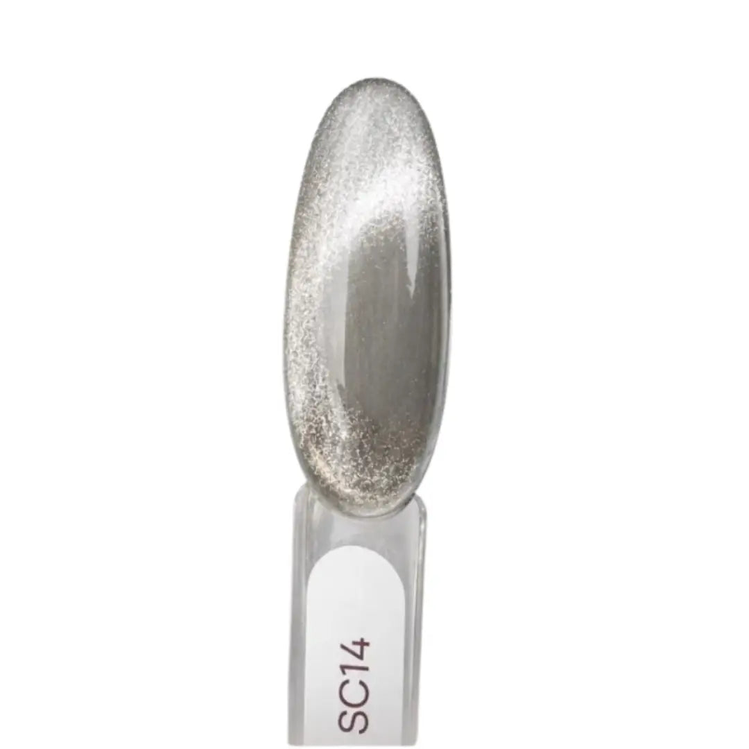 Close up of Atica Satin Cat's Eye SC14 silver-milky magnetic pattern applied on nail tip