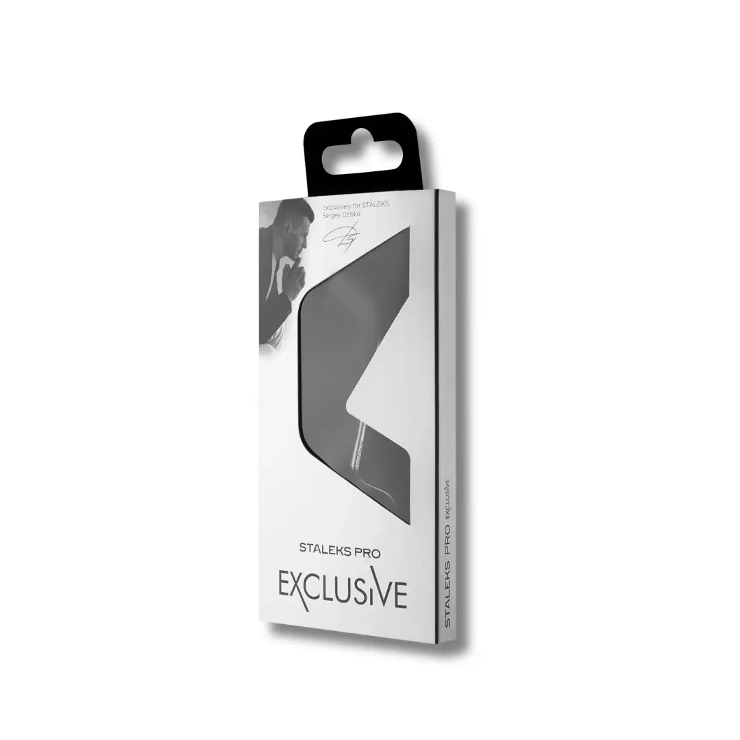 Hook-shaped scissor tip and magnolia engraving closeup