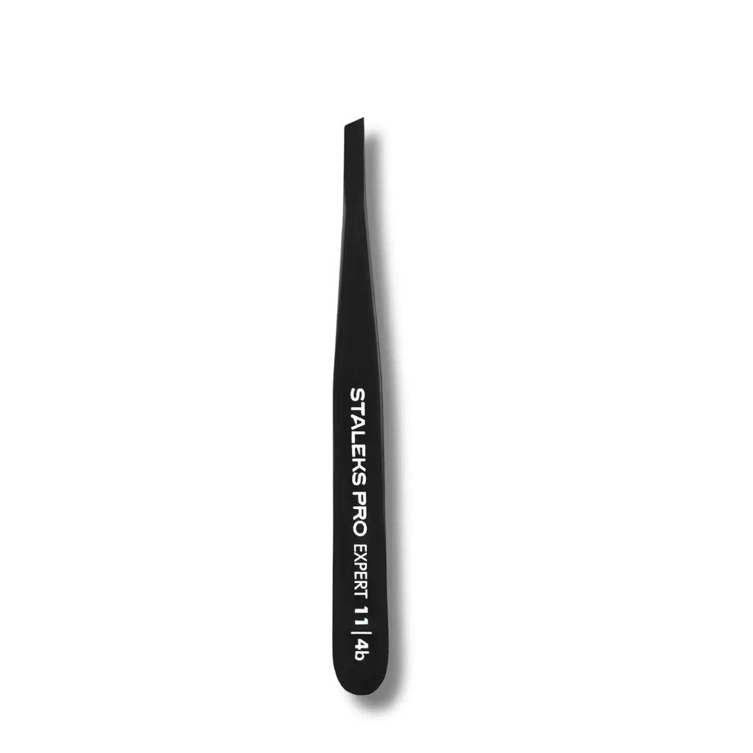 Narrow beveled tweezer tip closeup for fine eyebrow hairs